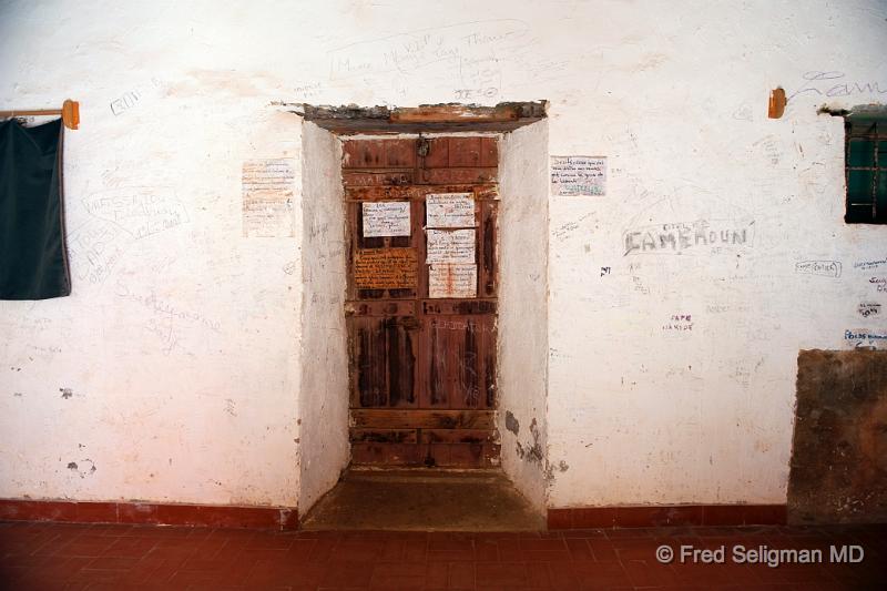 20090528_103147 D3 P1 P1.jpg - The writings of the captured is still present on the walls.  Also still present are markings indicating the weights of individuals, dates of sailings etc.  Captors seem to have an obsessive need to maintain such records.  The denial of the enormity of the moment is buried in the record keeping rather than in the anxiety and actions of the moment.  Our records, for example, of  the 'mug shot', and fingerprints of prisoners is far better than the medical records of the prisoners themselves, our even of the general population!